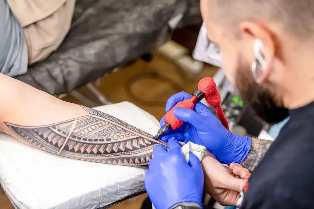 Fine line floral tattoo
